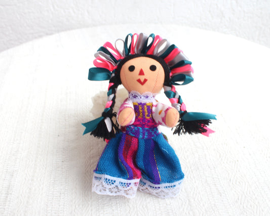 Muñeca Lelé Pequeña Rosa Esmeralda Gris
