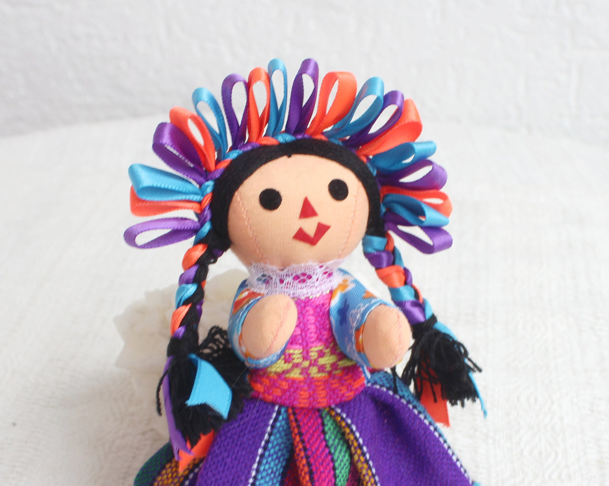 Muñeca Lelé Pequeña Lila Azul Naranja