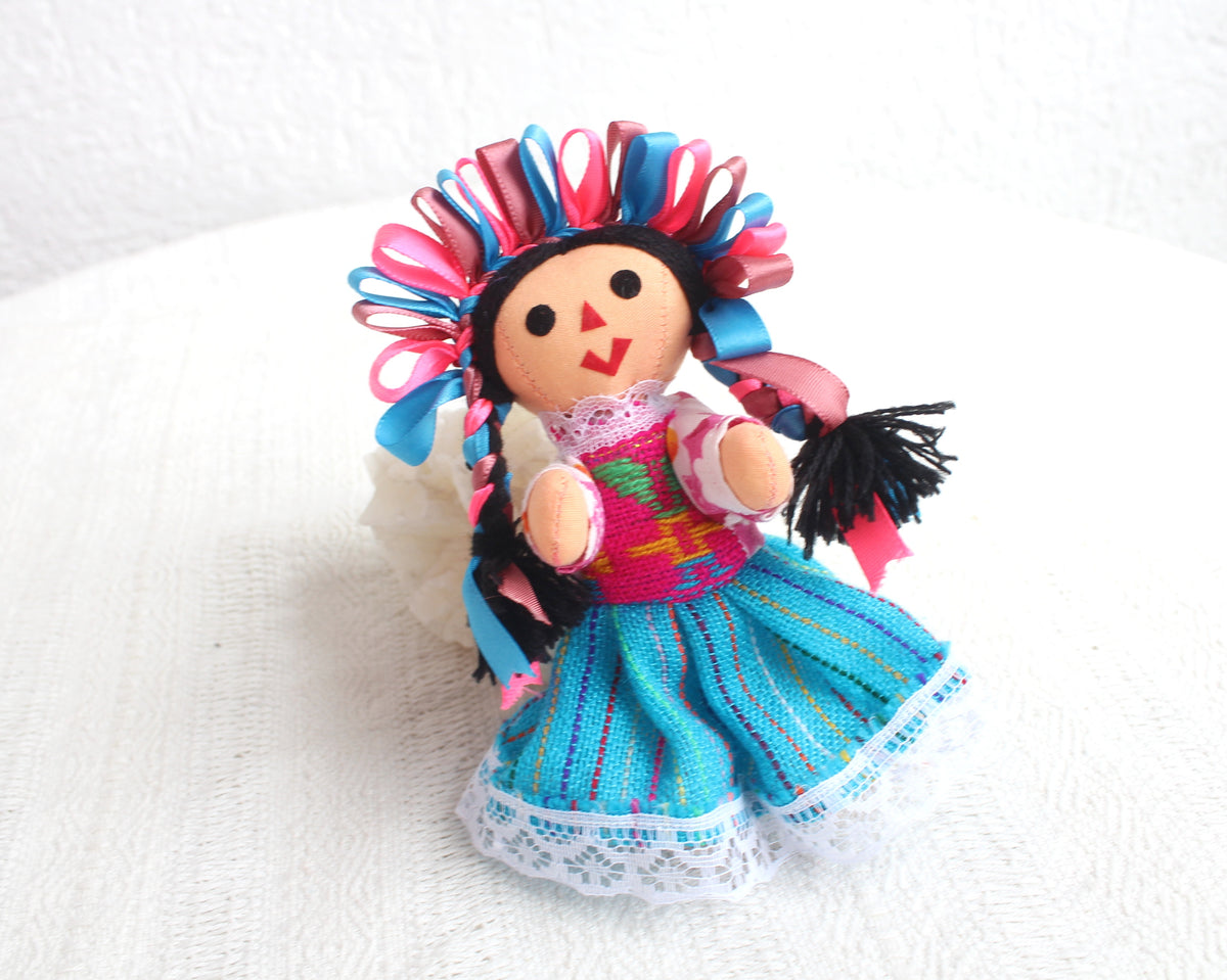 Muñeca Lelé Pequeña Azul Rosa Marsala
