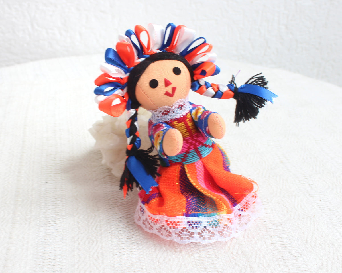 Muñeca Lelé Pequeña Azul Naranja Blanco