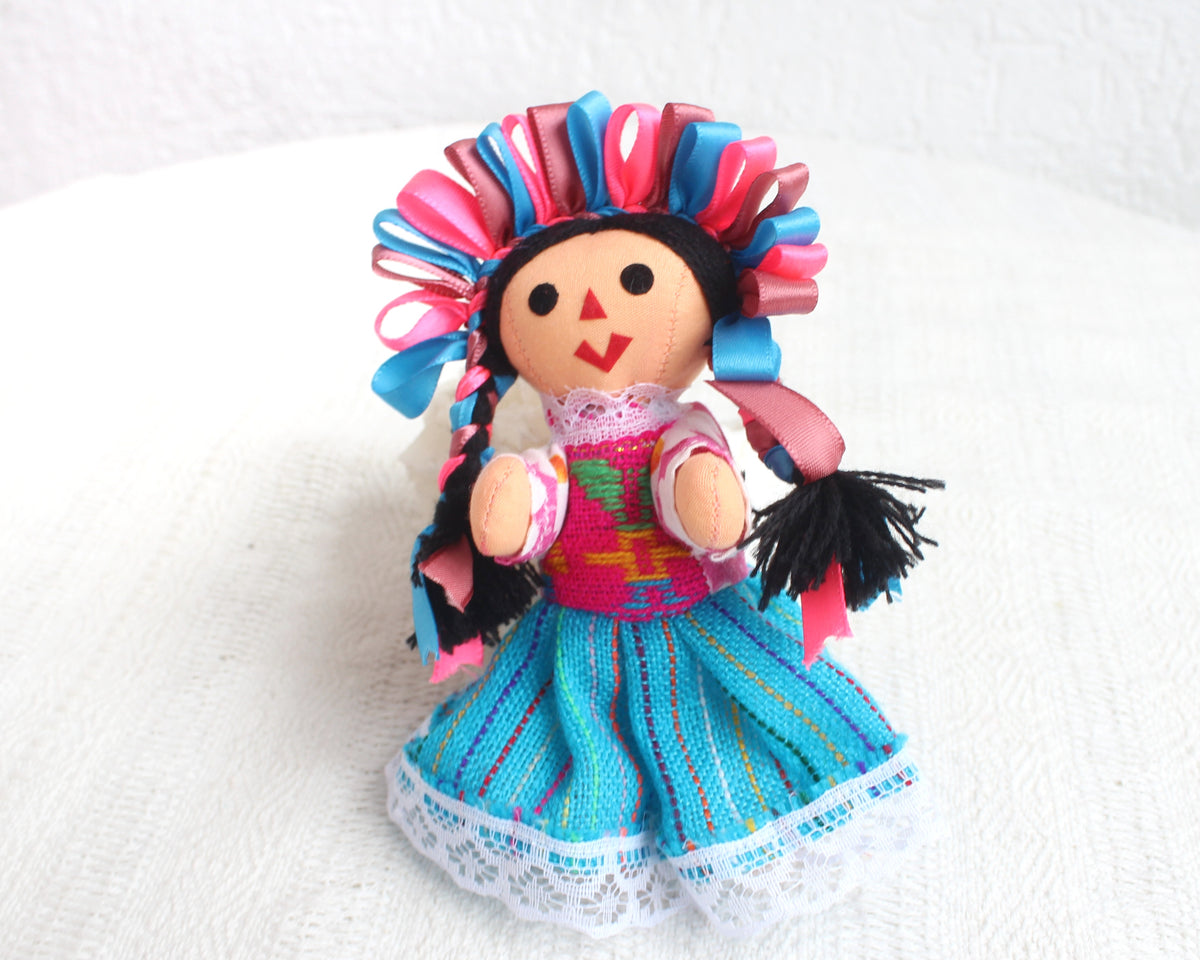 Muñeca Lelé Pequeña Azul Rosa Marsala