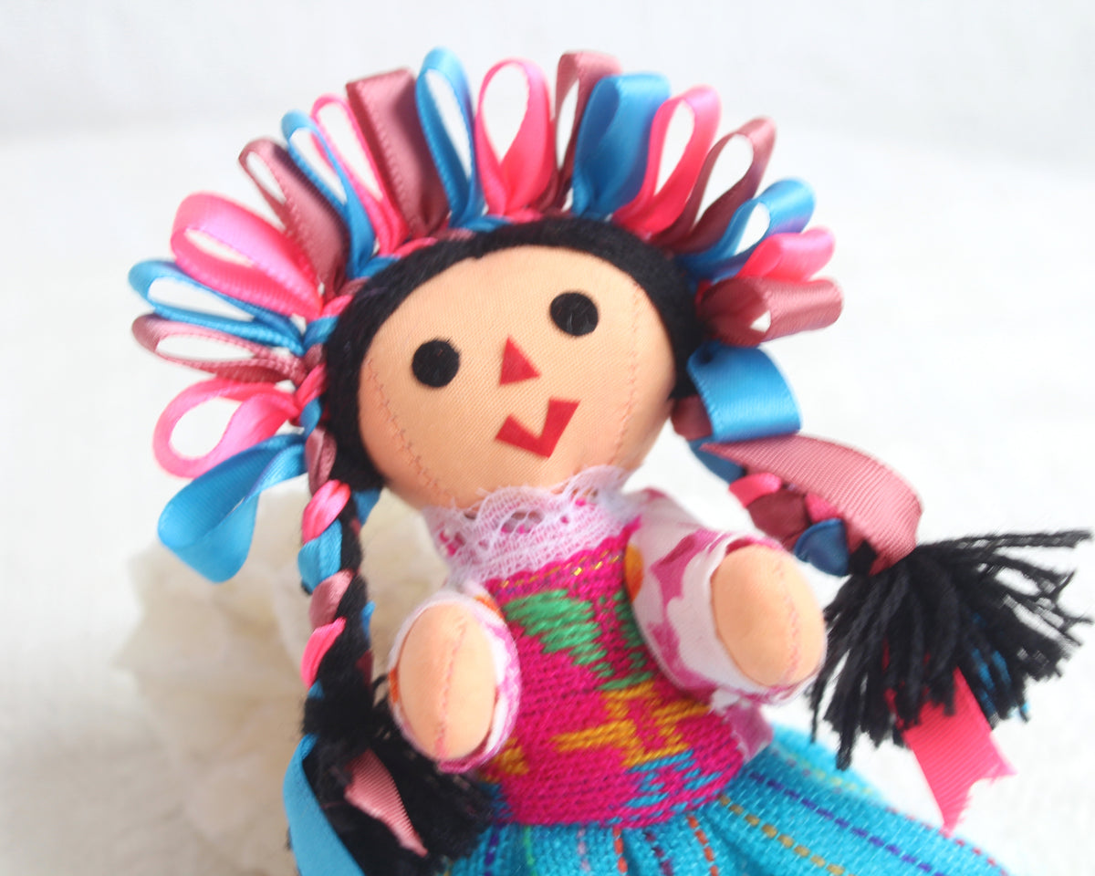 Muñeca Lelé Pequeña Azul Rosa Marsala
